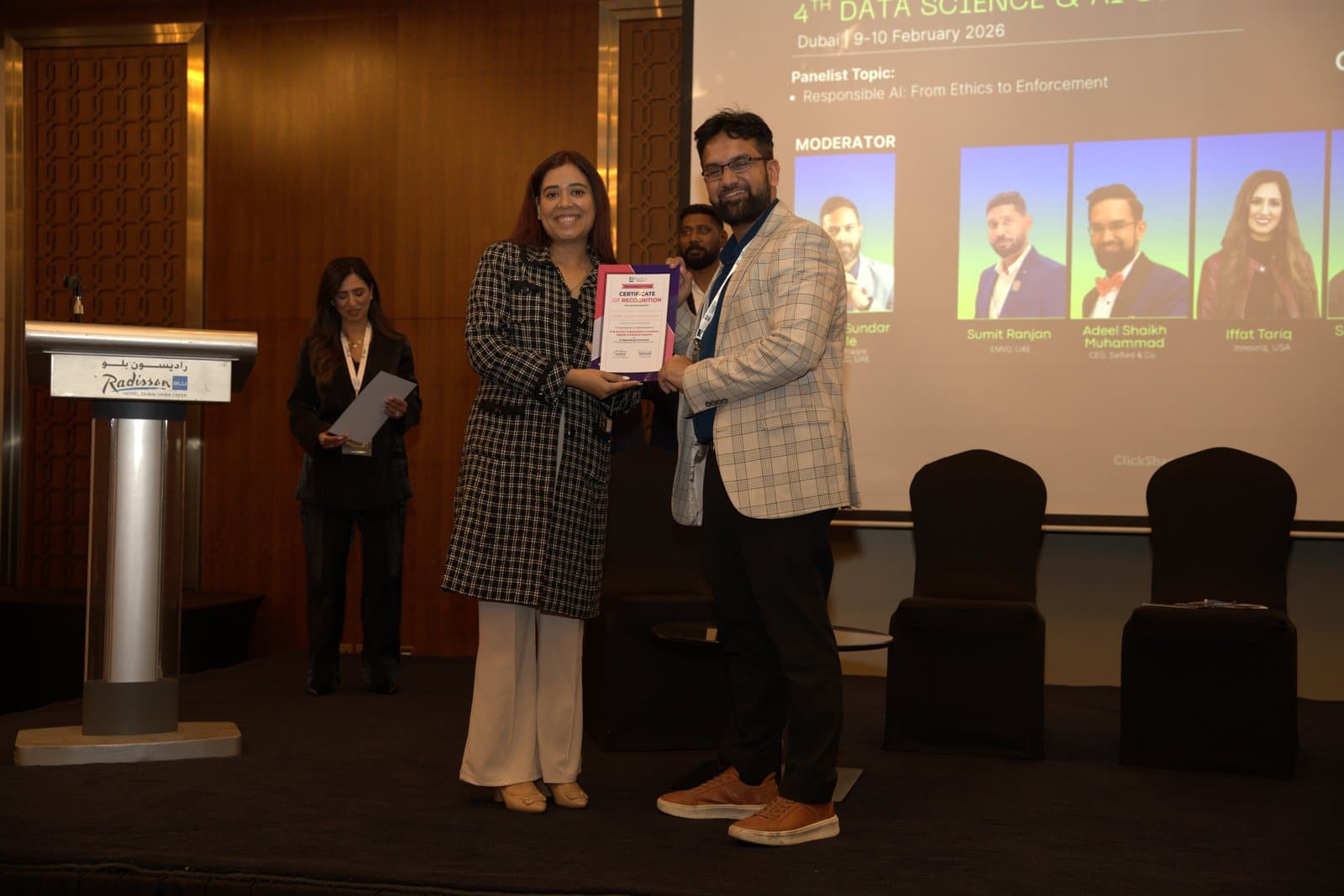 Receiving certificate on stage